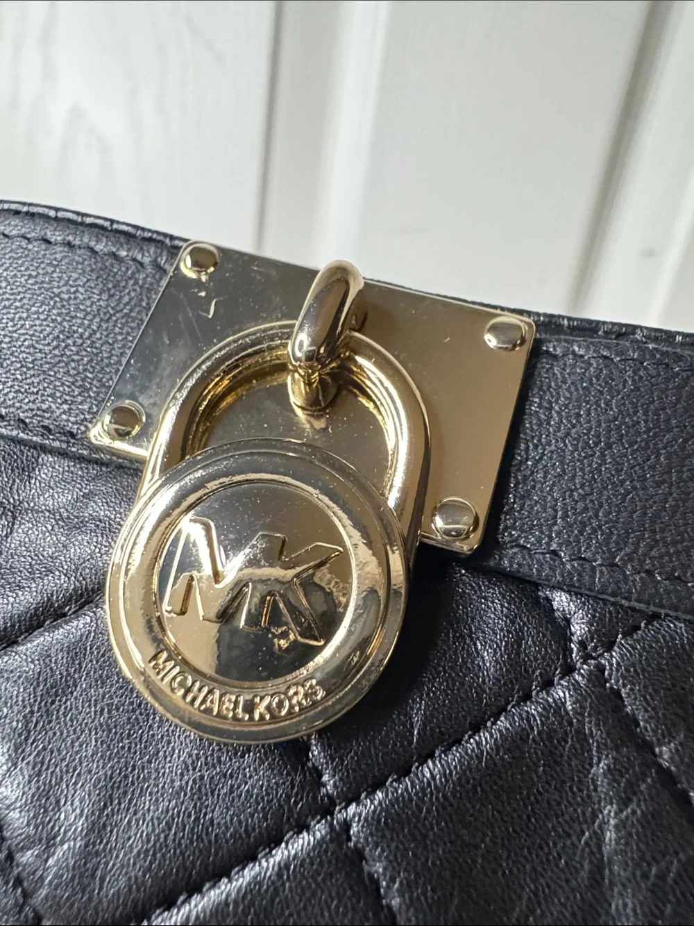 Michael Kors Black Quilted Leather Gloves with Gold Lock Detail